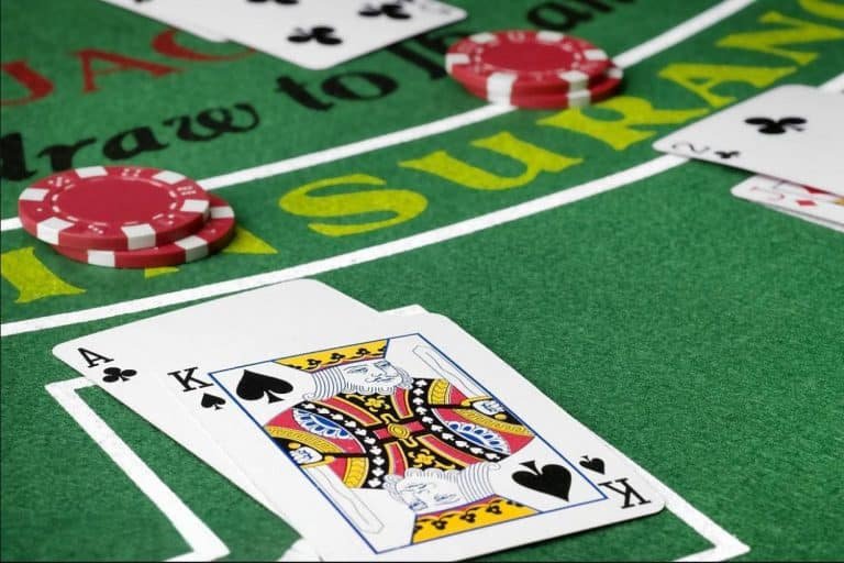 Live blackjack table on babetoto login showing dealer, cards, and player interface on mobile screen